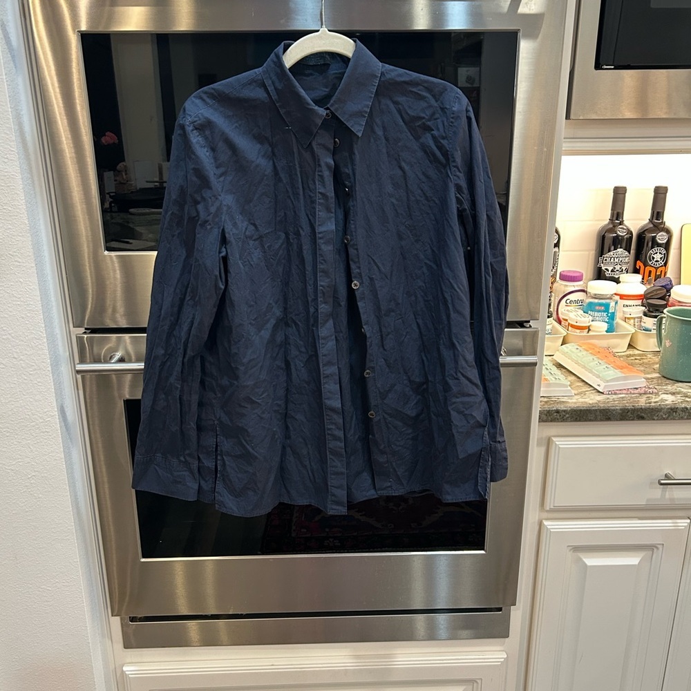 The Row Navy Blouse size 2 has slight wear overall GUC
